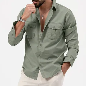 Close-up of men's olive green long-sleeve utility shirt with chest pockets and buttons.