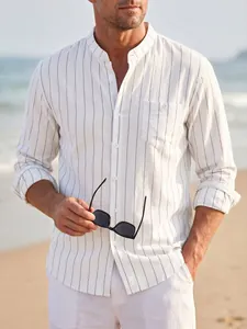 Detailed view of men's white striped linen shirt with mandarin collar at the beach