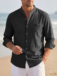 Close-up detail of a men's grey striped linen shirt with stand collar and pocket.