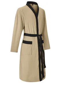 Detail view of men's long ribbed jacquard bathrobe with black contrast belt and trim