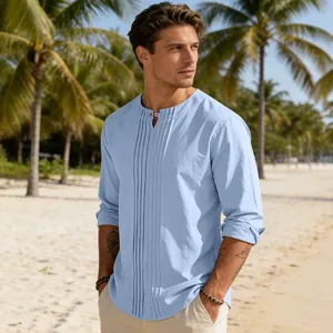 Light blue men's long sleeve cotton linen shirt with pleated detail for beach vacation