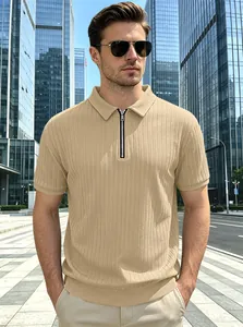 Model wearing a beige vertical stripe knitted polo shirt in an urban setting