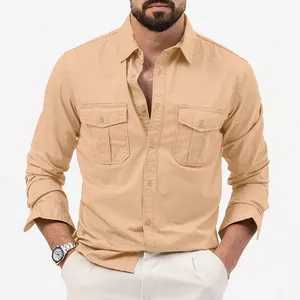 Detail of men's khaki long-sleeve work shirt with dual chest pockets and lapel collar