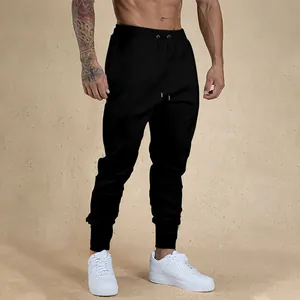 Black high-elasticity slim-fit men's athletic joggers with drawstring waist and ribbed cuffs