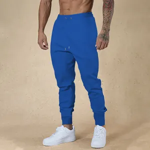 Pantaloni sportivi da uomo blu elasticizzati slim fit con vita elastica e polsini