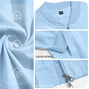 Close-up of light blue men's bomber jacket showing fabric texture and zipper details