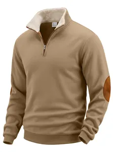 Detailed shot of retro brown half-zip sweatshirt with fleece collar and elbow patches.