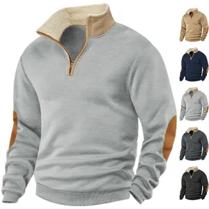 Detailed view of grey men's retro half-zip sweatshirt with fleece collar and elbow patches.