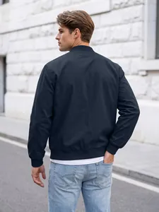 Back view of a classic navy blue men's bomber jacket with ribbed cuffs and hem.