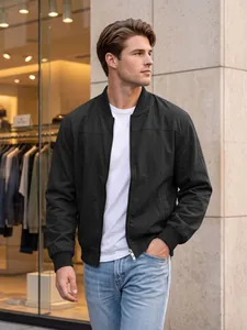 Detail showing the fit of a men's black pilot jacket with side pockets on a model