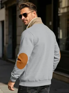 Men's grey quarter-zip sweatshirt with retro brown elbow patches and stand collar details