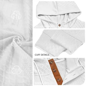 Detailansicht von weißem Jacquard-Hoodie-Stoff, Kragen, Bündchen und Nähknöpfen