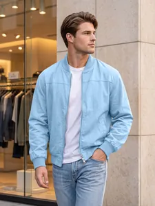 Close-up view of a light blue men's bomber jacket showing its ribbed cuffs and zipper