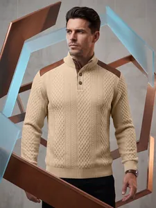 Close-up of men's beige knit sweater with stand collar and brown leather shoulder patches