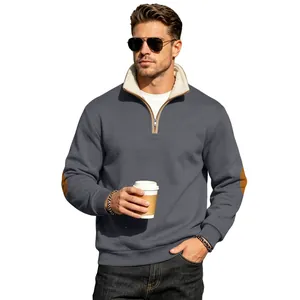 Vintage men's half-zip sweatshirt featuring a fleece-lined collar and stylish elbow patches.