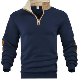 Vintage navy blue men's half-zip sweatshirt with fleece lining and camel elbow patches