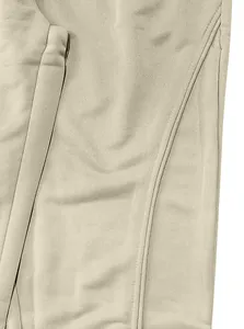 Close-up detail of the breathable fabric and durable seams on these men's casual joggers.