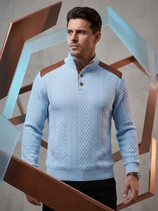 Detailed view of men's blue knit sweater with brown shoulder patches and high neck.