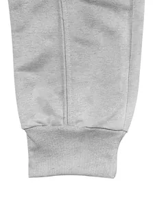 Detail of grey joggers featuring high-quality ribbed elastic cuffs for a snug fit