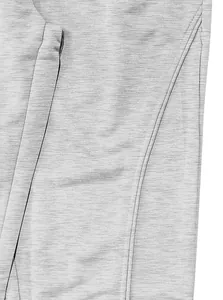 Macro detail of grey textured athletic fabric showing stitching and weave pattern.