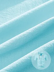 Macro shot of light blue breathable cotton-linen fabric texture for men's hooded shirt