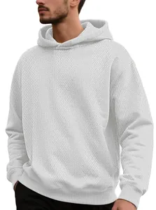 Detailed view of the diamond jacquard texture on this white men's hooded sweatshirt