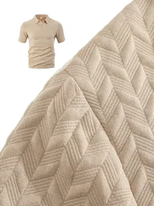 Detailed macro view of men's polo shirt featuring chevron jacquard textured knit fabric