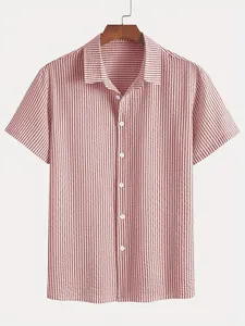 Close-up detail of a men's red striped short-sleeve shirt with seersucker texture
