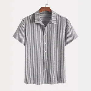 Close-up of vertical striped short-sleeved shirt with classic collar and buttons.