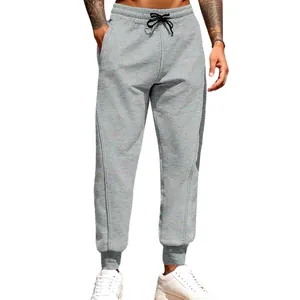 Men's relaxed fit gray marl joggers featuring a drawstring waist and elastic cuffs