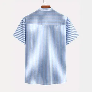 Men's vintage blue and white striped short sleeve shirt hanging against gray background