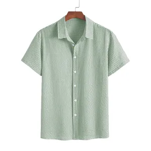 Classic men's vintage green and white vertical striped short sleeve shirt on a wooden hanger