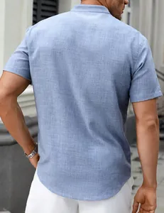 Back view of men's blue stand collar short sleeve shirt showing fabric texture