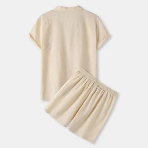 Back view of minimalist beige men's cotton linen short sleeve shirt and matching shorts