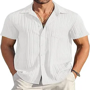Close-up detail of men's white short sleeve shirt with vertical pleated texture