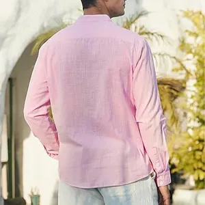 Men's casual pink cotton linen long sleeve shirt, back view in outdoor beach setting