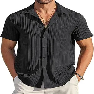 Close-up of men's black short-sleeved shirt featuring a unique vertical pleated texture
