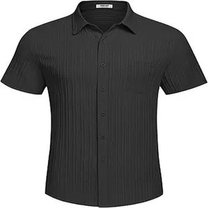 Detailed view of black short-sleeved shirt with vertical pleat texture and chest pocket.