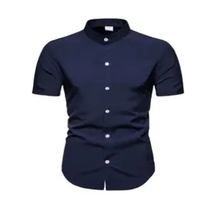 Detailed view of navy blue short sleeve shirt with white buttons and mandarin collar.
