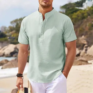 Detailed texture of men's mint green waffle knit short sleeve henley shirt