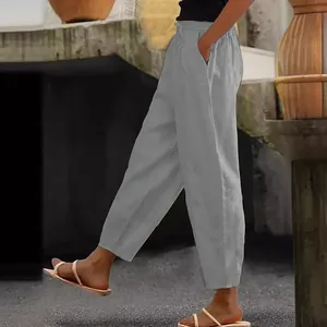 Detailed side profile of gray cotton linen casual trousers with elastic drawstring waist