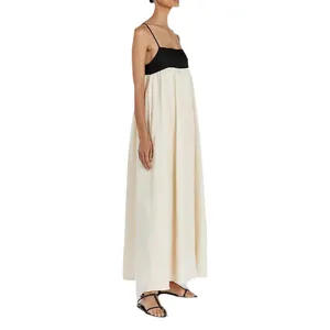 Elegant black and cream color-block spaghetti strap maxi dress for summer resort wear