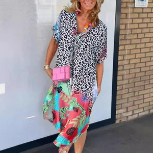 Vibrant colorful leopard print summer dress with loose fit and stylish split neckline