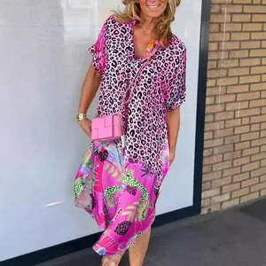 Vibrant pink leopard and tropical print loose dress with a half-button collar for summer