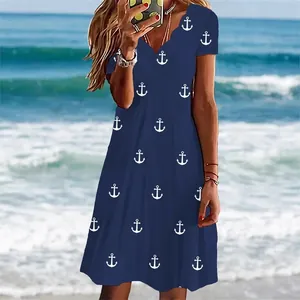Abito estivo blu navy a maniche corte con stampa àncora e scollo a smerlo.