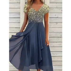 Elegant V-neck summer dress featuring a glitter gradient top and flowing blue chiffon skirt
