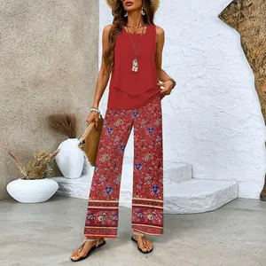 Bohemian two-piece set featuring a red sleeveless tank top and floral wide-leg pants