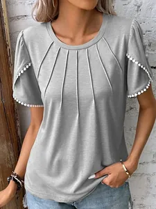 Detail view of grey pleated crew neck t-shirt with delicate white lace trim sleeves