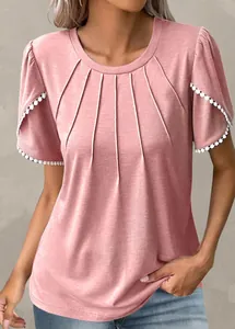 Detailed view of pink pleated T-shirt with white pom-pom lace trim on short sleeves