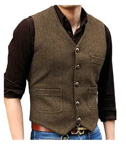 Close-up of men's brown herringbone tweed vest featuring vintage metal buttons detail.